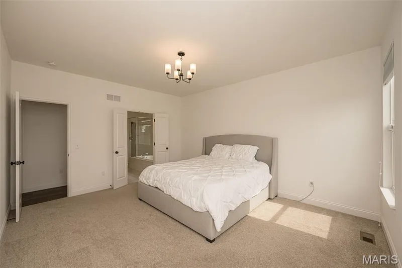 Primary Bedroom Suite with ensuite luxury bathroom — 325 Gailin Drive, Lake St. Louis, MO 63367