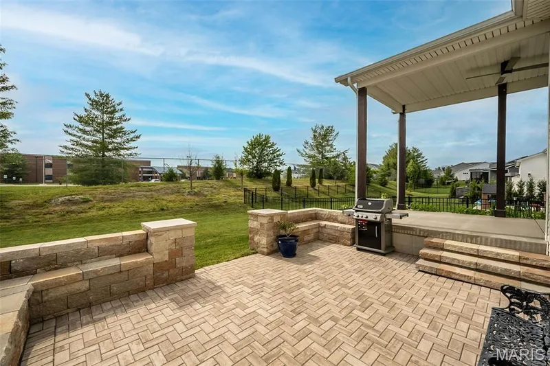 Beautiful patio and retaining wall - perfect for enjoying evening outside! — 325 Gailin Drive, Lake St. Louis, MO 63367