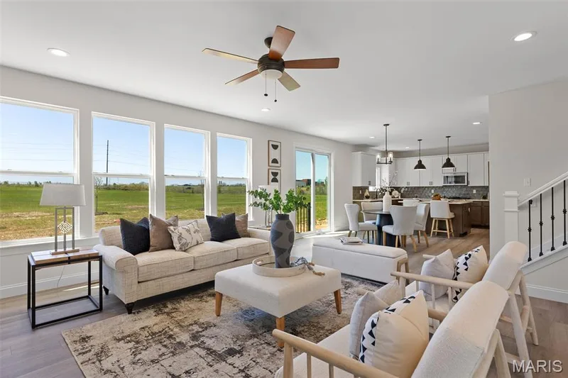 Great Room with view of window wall and Kitchen area — 305 Healthy Way, St Charles, MO 63304