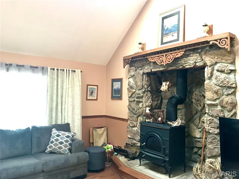 freestanding wood burning fireplace — 1325 2nd Street, Portage Des Sioux, MO 63373