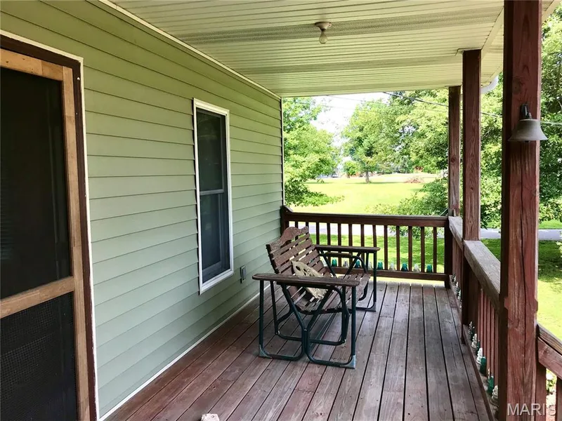large front porch — 1325 2nd Street, Portage Des Sioux, MO 63373