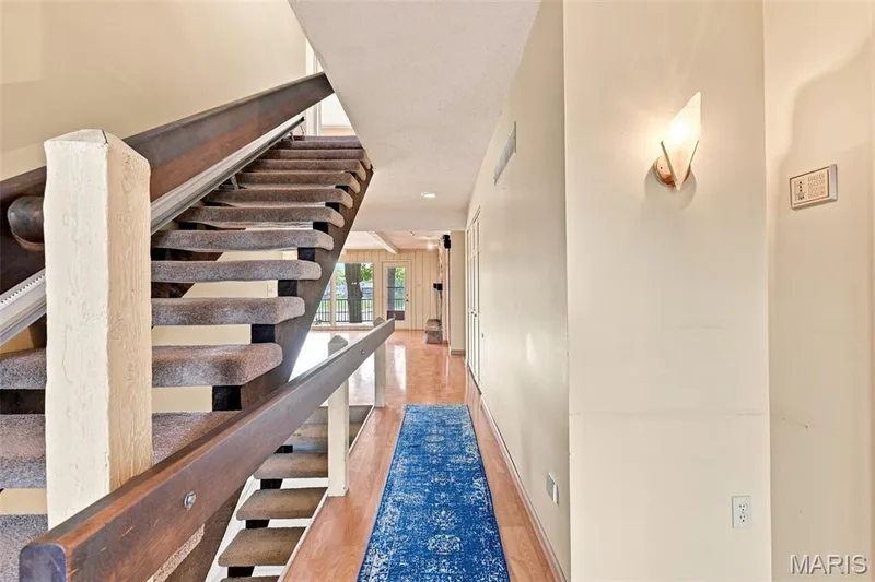 Gorgeous entry foyer area leading to the open floor plan with gorgeous waterfront views! — 4 Harbor Point Court, Lake St. Louis, MO 63367
