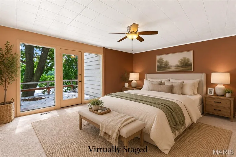 Primary Bedroom with large walk-in closet, full En Suite and atrium door to a private balcony — 4 Harbor Point Court, Lake St. Louis, MO 63367