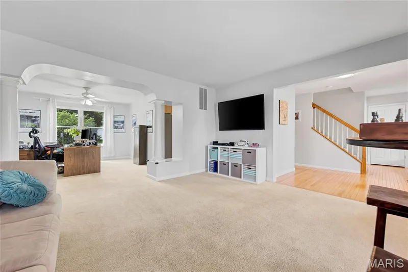 Another view of how the main floor of Bear Fountain flows.  This shows the entry way, formal living room and formal dining room. — 2304 Bear Fountain Run, Wentzville, MO 63385