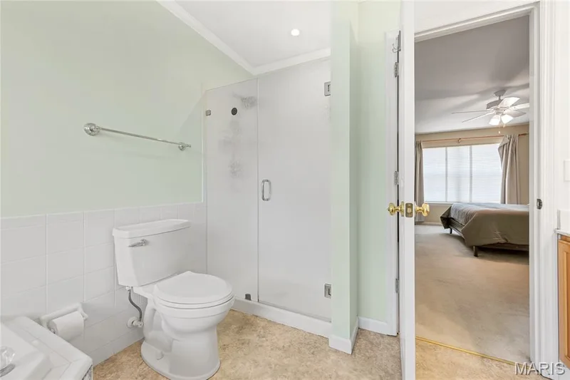 Also located in the master en suite is a separate shower with glass doors. — 2304 Bear Fountain Run, Wentzville, MO 63385