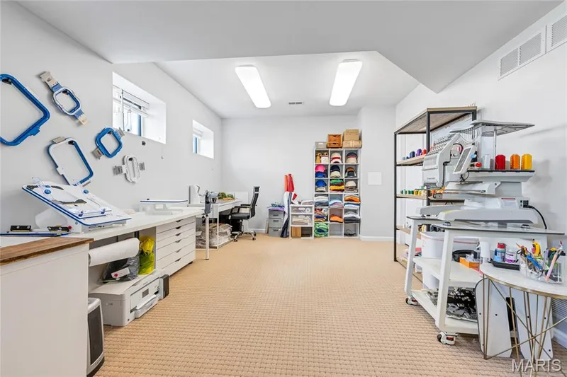 Just beyond the finished area of the basement is a large storage room. — 2304 Bear Fountain Run, Wentzville, MO 63385
