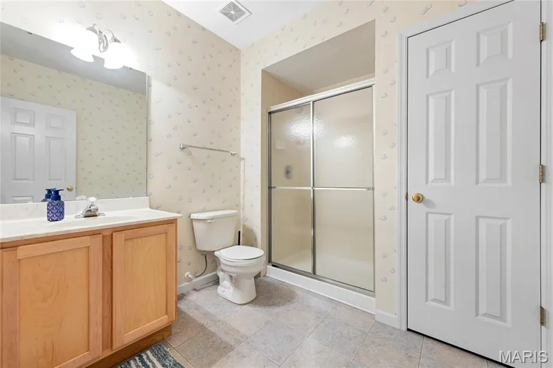 Full bathroom with shower only in the basement plus a linen closet — 2304 Bear Fountain Run, Wentzville, MO 63385