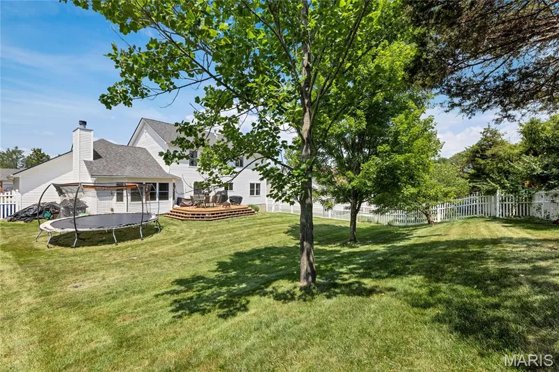 Fully fenced in backyard with mature trees. — 2304 Bear Fountain Run, Wentzville, MO 63385