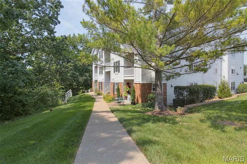 Short walk from covered parking to your condo, best part no stairs — 16566 Victoria Crossing Drive #B, Wildwood, MO 63040