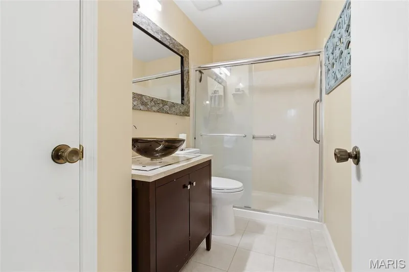 Walk in shower, beautiful vanity with vessel glass bowl — 16566 Victoria Crossing Drive #B, Wildwood, MO 63040
