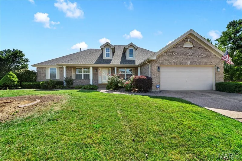 Overgrown pine tree removed — 3201 Bear Tracks Drive, Wentzville, MO 63385