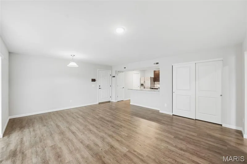 Spacious Family Room and breakfast room w/ LVP flooring — 321 Bordeaux Way, St Peters, MO 63376