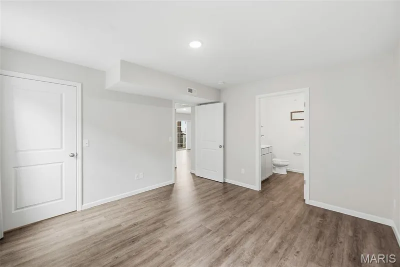 Spacious Primary Suite with LVP Flooring and en-suite bath & walk-in closet — 321 Bordeaux Way, St Peters, MO 63376