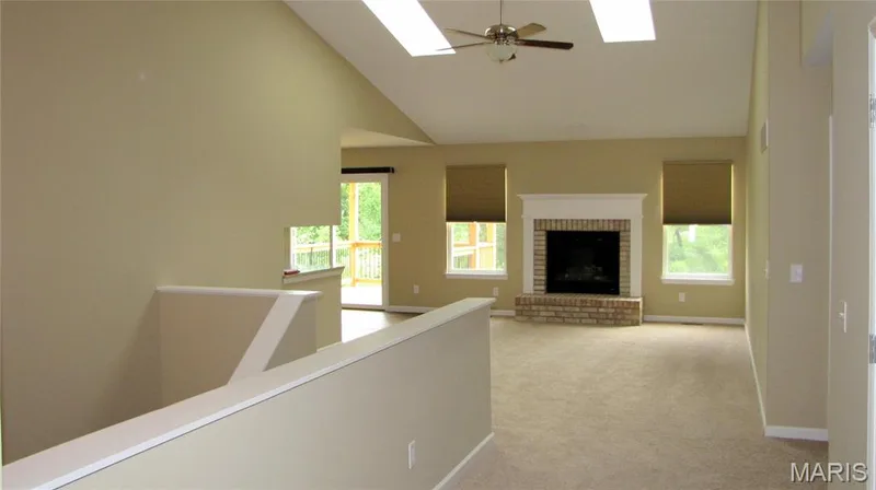 Looking from Foyer into great room with bedrooms to right of picture. — 110 Fallon Villa Court, O'Fallon, MO 63368
