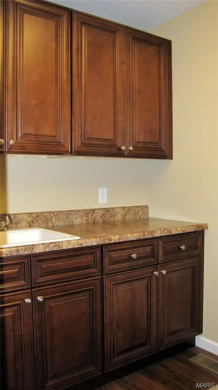 Cabinets in laundry room. — 110 Fallon Villa Court, O'Fallon, MO 63368
