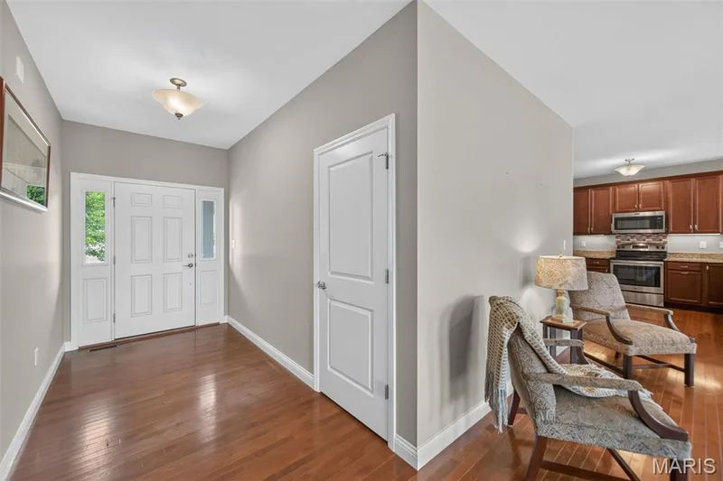 Entryway with coat closet — 1125 Duxbury Lane, O'Fallon, MO 63366