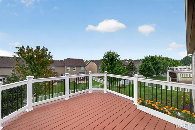 Spacious outdoor deck featuring composite decking — 1125 Duxbury Lane, O'Fallon, MO 63366