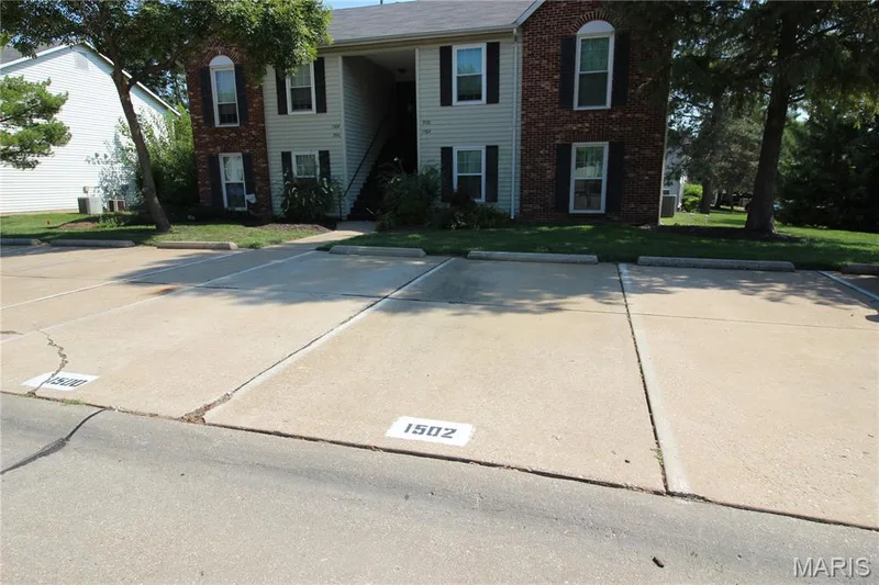 Front with assigned parking space — 1502 Surrey Lane, St Peters, MO 63304