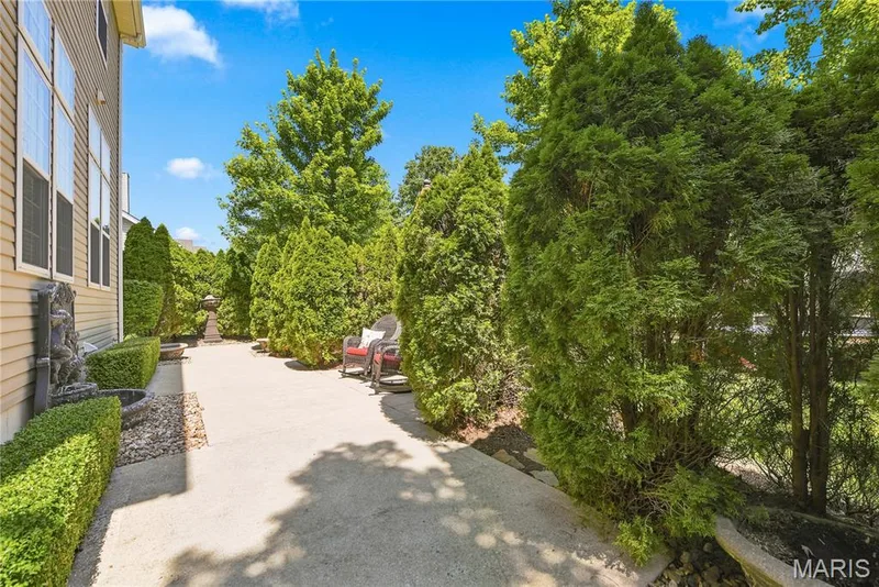 Lovely private landscaped patio — 5500 Wooded Creek Drive, O'Fallon, MO 63304
