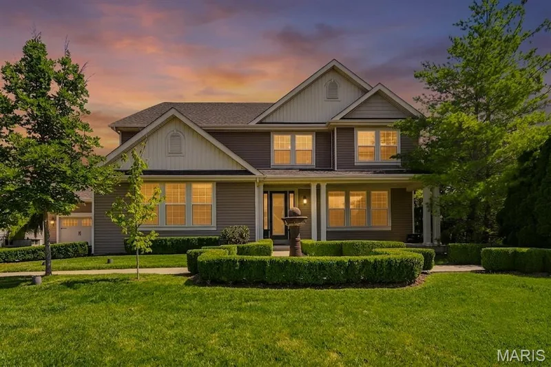 Front of the home at twilight — 5500 Wooded Creek Drive, O'Fallon, MO 63304