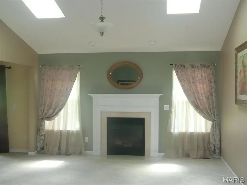Great room fireplace and skylites. — 118 Fallon Villa Court, O'Fallon, MO 63368