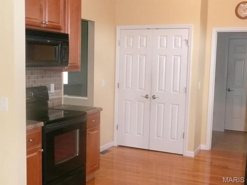 Double door pantry. — 118 Fallon Villa Court, O'Fallon, MO 63368