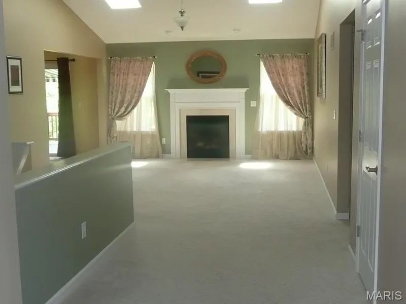From front door through great room. — 118 Fallon Villa Court, O'Fallon, MO 63368