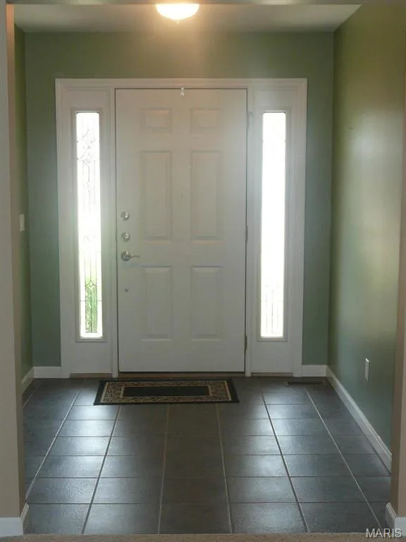 Large foyer, second bedroom is to the Left of picture. — 118 Fallon Villa Court, O'Fallon, MO 63368