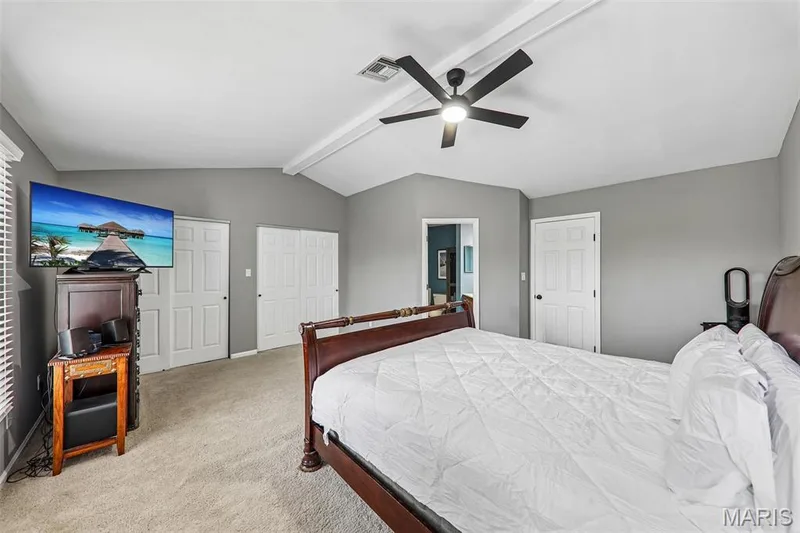 Spacious room with vaulted ceilings and a ceiling fan — 16180 Lea Oak Court, Chesterfield, MO 63017