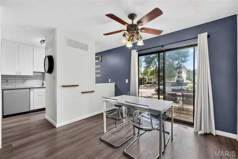 Dining Area, Sliding Door to the Patio and the Kitchen — 2701 Falcons Way #132, St Charles, MO 63303
