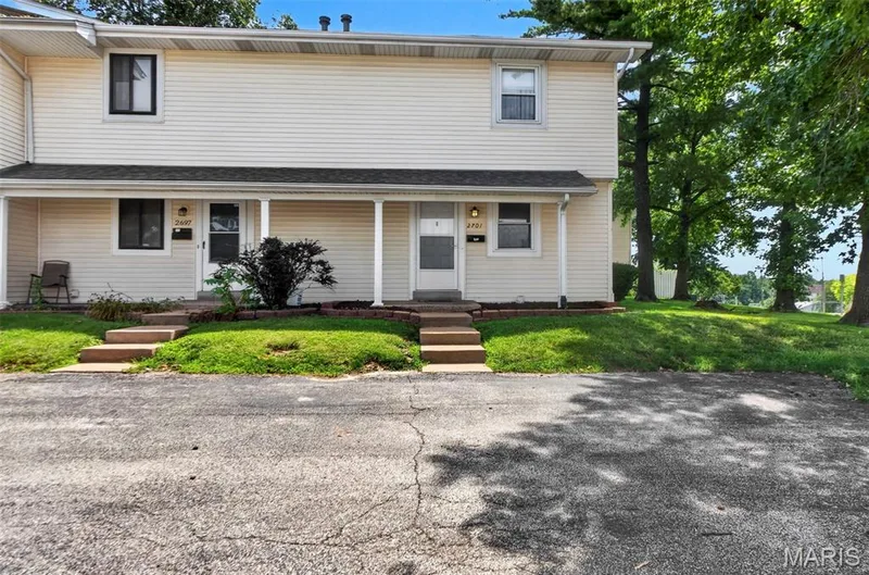 Front Door with steps down to parking area — 2701 Falcons Way #132, St Charles, MO 63303