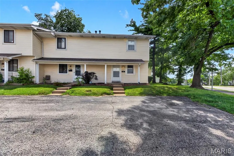 Front Entrace with covered area to access the front door — 2701 Falcons Way #132, St Charles, MO 63303