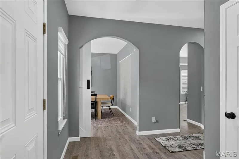 Front door Entry/ coat closet and stairs to the right — 206 Hawksbury Place, O'Fallon, MO 63368