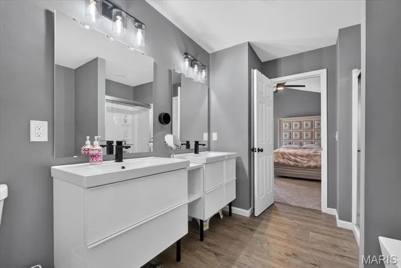 primary bathroom w/ linen closet behind the door — 206 Hawksbury Place, O'Fallon, MO 63368