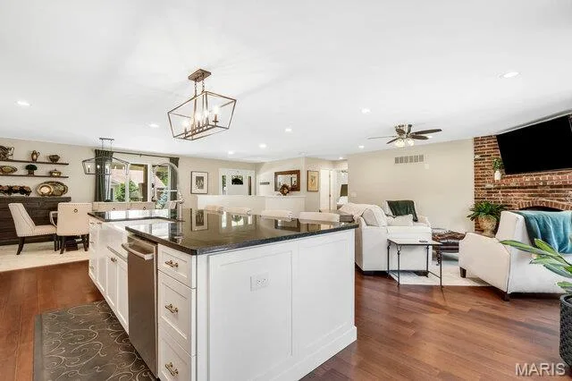 View from the kitchen to the family room and dining room. — 15578 Summer Lake Drive, Chesterfield, MO 63017
