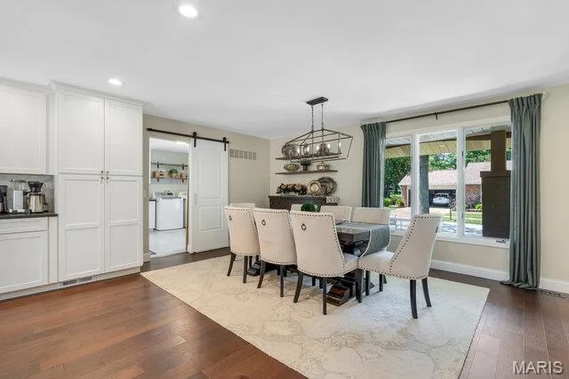 Dining room will accommodate an 8-12 person table. — 15578 Summer Lake Drive, Chesterfield, MO 63017