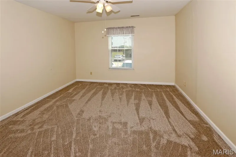 Bedroom with full bathroom through the adjoining hallway — 116 Jubilee Hill Drive #G, Wildwood, MO 63040