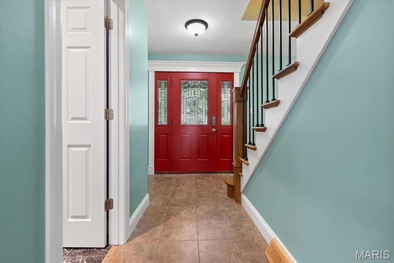 Entry and view of hallway to kitchen and Great room — 44 Wilderness Lane, Defiance, MO 63341