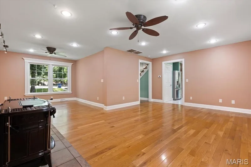 Dual fans in L of great room with triple pane. insulated frame Certainteed windows — 44 Wilderness Lane, Defiance, MO 63341