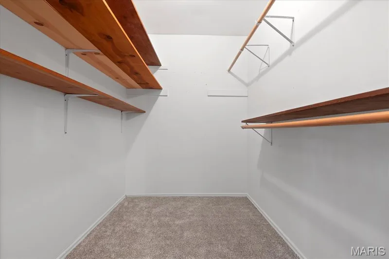 Primary bedroom walk in closet — 44 Wilderness Lane, Defiance, MO 63341