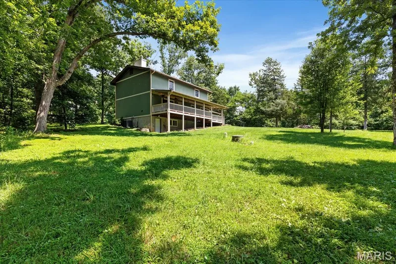 Expansive green lawn — 44 Wilderness Lane, Defiance, MO 63341
