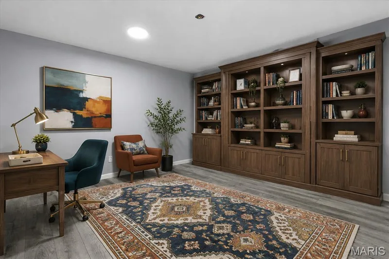 Shows Possible Office/Bedroom staging with Murphy Bed Hidden — 44 Wilderness Lane, Defiance, MO 63341