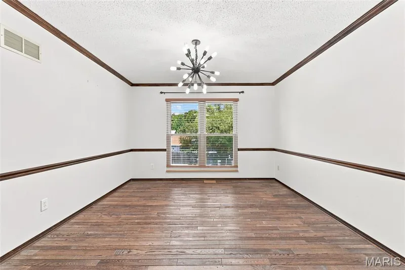 Separate Dining Room w/Bambo Hardwood Flooring — 3927 Summerfield Parkway, St Charles, MO 63304