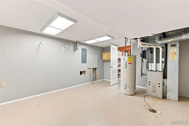 Finished Lower Level Utility Room w/updated furnace and water heater — 3927 Summerfield Parkway, St Charles, MO 63304