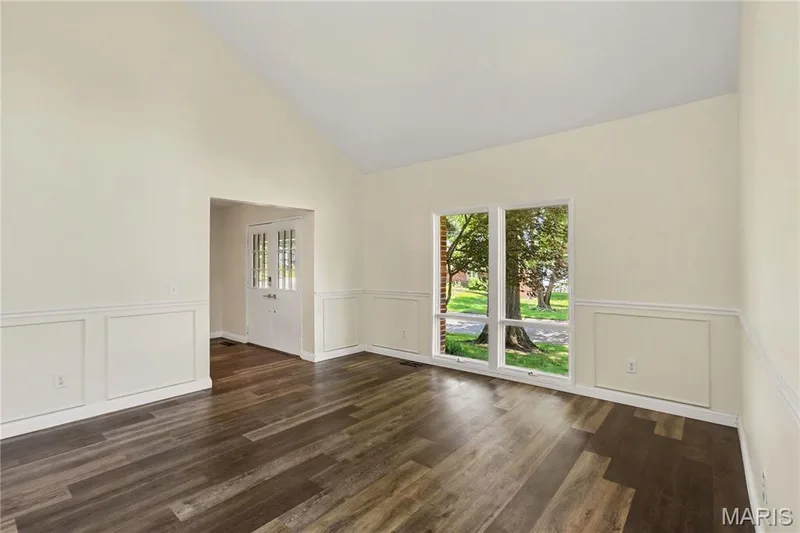 View of living room from family room — 22 Normandy Drive, Lake St. Louis, MO 63367