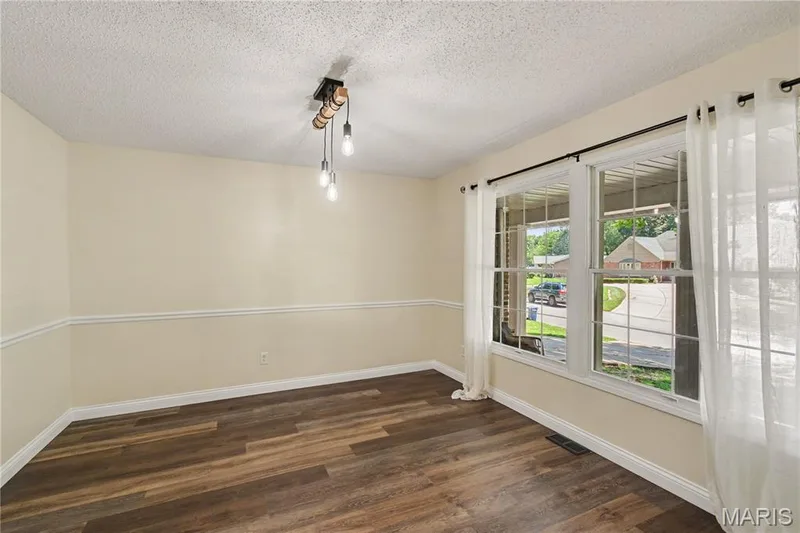 Separate dining room — 22 Normandy Drive, Lake St. Louis, MO 63367
