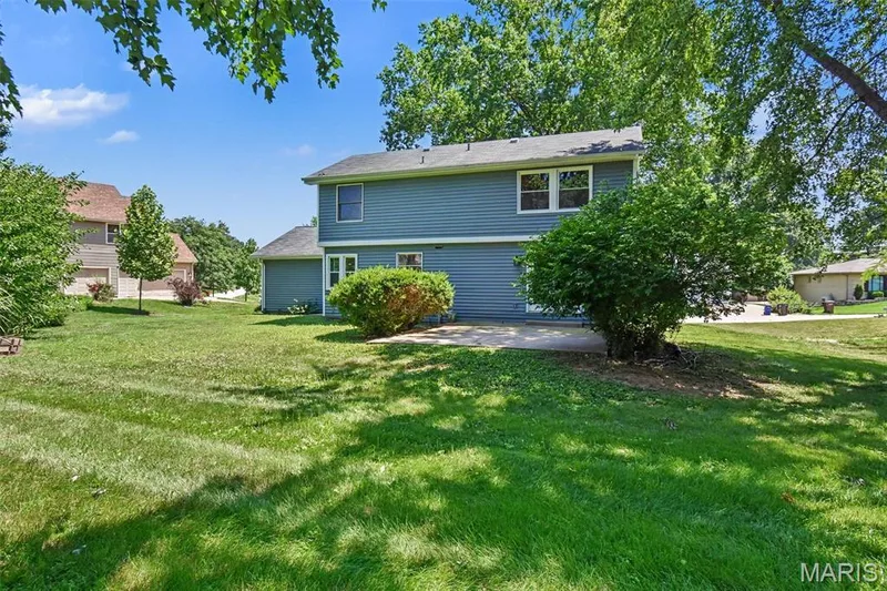 Back of home and backyard — 22 Normandy Drive, Lake St. Louis, MO 63367