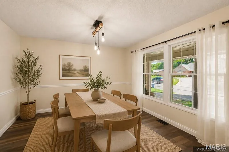 Virtually staged dining room — 22 Normandy Drive, Lake St. Louis, MO 63367