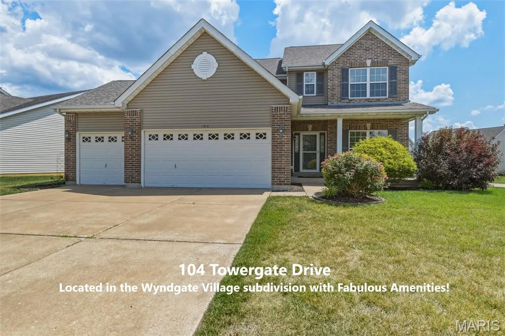 104 Towergate Drive in Wyndgate Village has 4 bedrooms and 2.5 bathrooms, a fully fenced yard and a 3-Car Garage — 104 Towergate Drive, Lake St. Louis, MO 63367