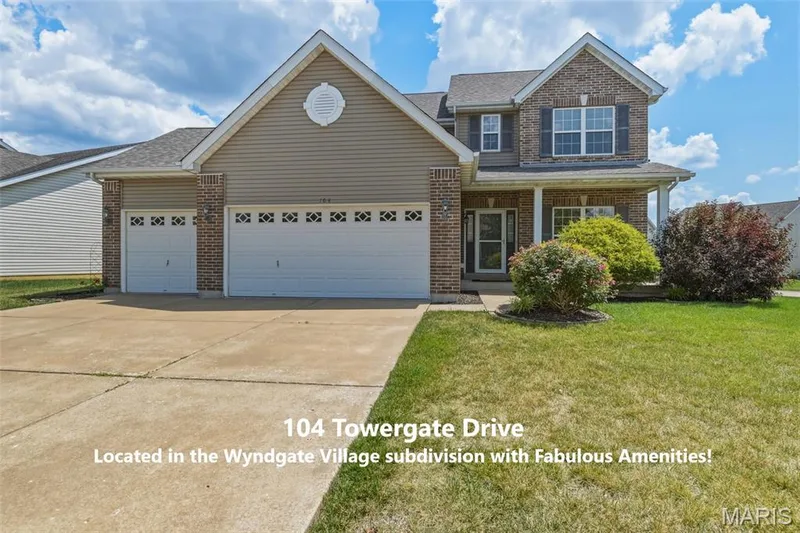 104 Towergate Drive in Wyndgate Village has 4 bedrooms and 2.5 bathrooms, a fully fenced yard and a 3-Car Garage — 104 Towergate Drive, Lake St. Louis, MO 63367